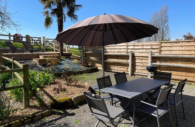 Maison chaleureuse avec terrasse et vue baie