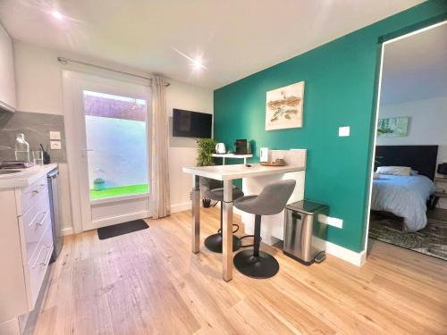 Maisonnette cosy avec extérieur en centre-ville