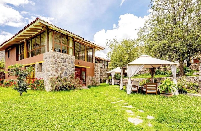 Modern and comfortable house with stunning views of the mountains and waterfall.