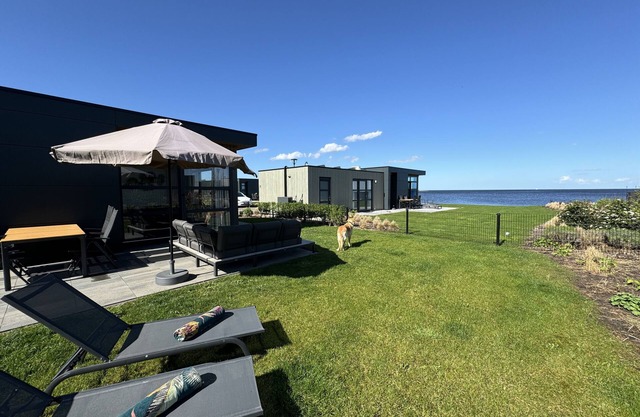 Modern Chalet with Exceptional Lake Views, Private Fenced Garden, Near the Beach