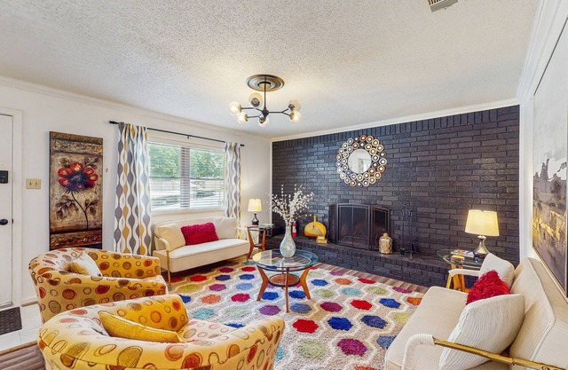 Modern condo with hot tub, pool access, fireplace, Smart TVs, & pets welcome