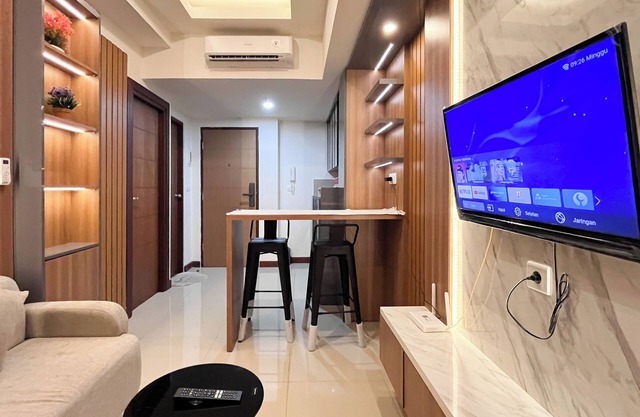 Modern Designed 2Br At Vida View Makassar Apartment