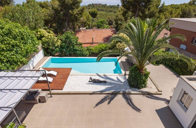 Modern house with pool and large garden