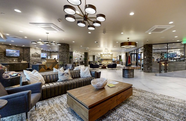 Modern resort condo with pool, hot tub, rolling foothill views + shuttle