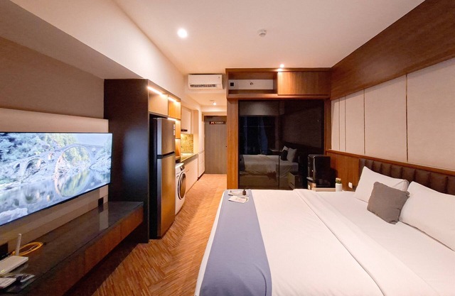 Modern Rustic Studio Apartment At Carstensz Residence