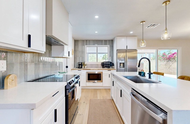 Modern updated home with private pool, large yard, gas grill