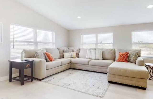 Modern Waterfront Escape with a Deck & BBQ Grill