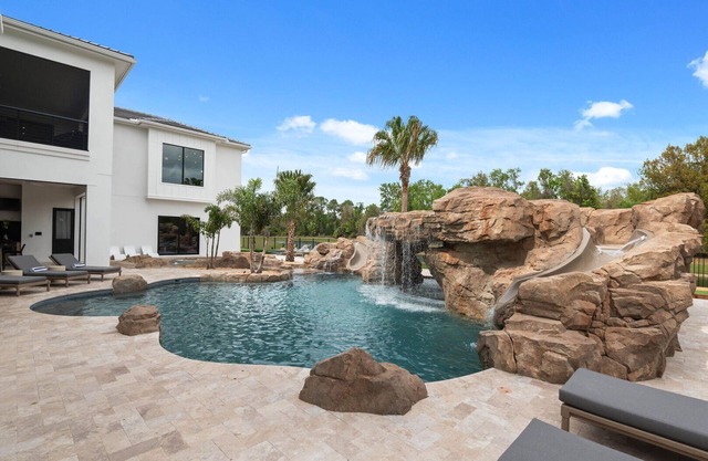 Morlando Three floor rocket ship, luxurious interior, back yard oasis with pool