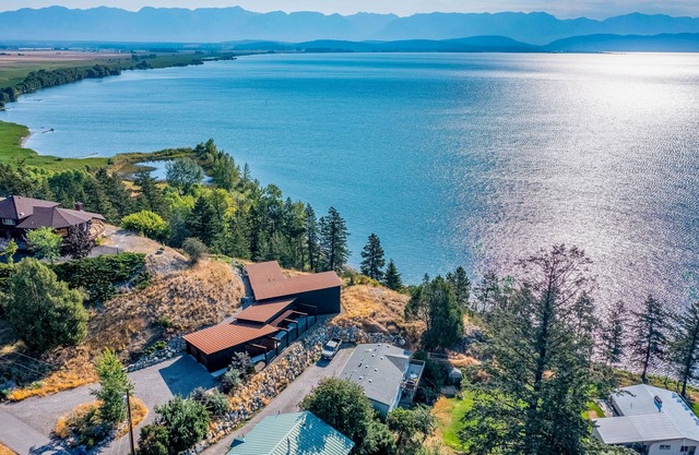 Mountain home with Flathead Lake views, balcony & grill