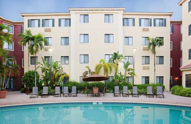 Near Beach | Outdoor Pool, Fitness Center