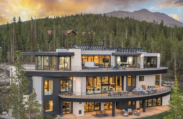 Nearly 12k sq ft of luxury, private ski shuttle, indoor pool, theater, 2 hot tubs, 360 views!