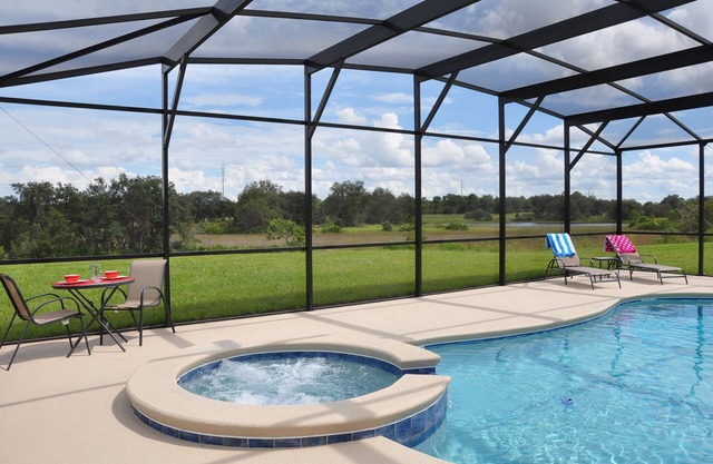 New 5 Themed bedrooms, 4 bath pool home on single level. 20 minutes to Disney