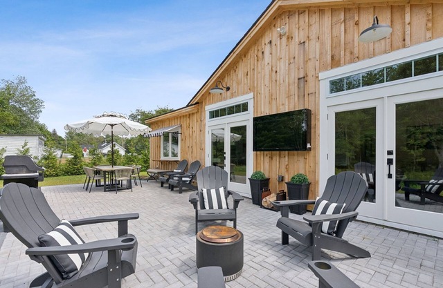 NEW construction! 1 Mile to BEACH! Outdoor TV, Shower, Firepit & more!