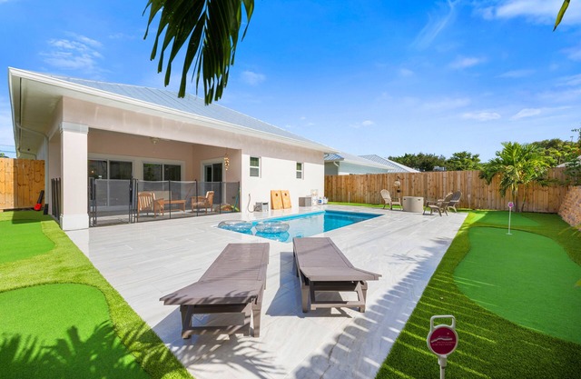 New Construction Home with Mini Golf, Game Room, and Heated Saltwater Pool!