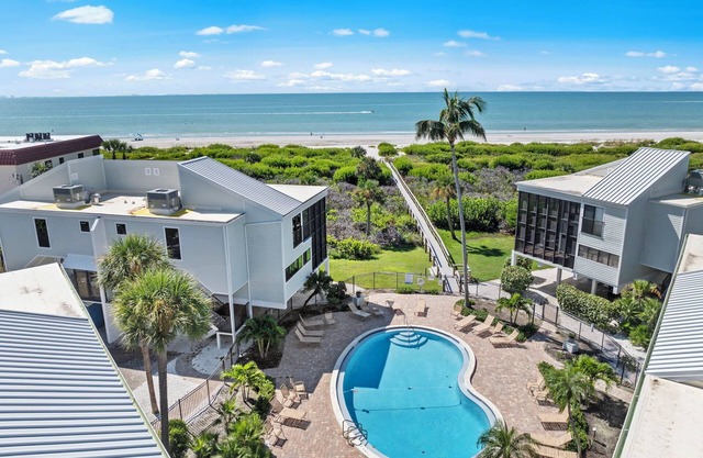 New Cyprina Unit #2 – a fully renovated, Serena & Lily–inspired townhome on Sanibel’s sought-after East End. This luxury beach retreat seamlessly blends coastal elegance with modern comfort, offering breathtaking direct water views from every room.
