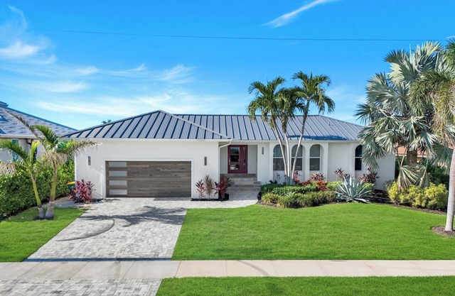 New Listing! Recently updated waterfront 3-bedroom home with heated pool