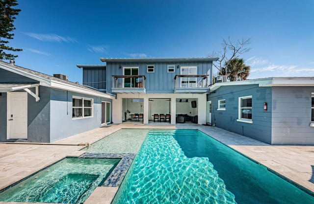 New listing Spacious 4-Bedroom beach cottage steps from the beach