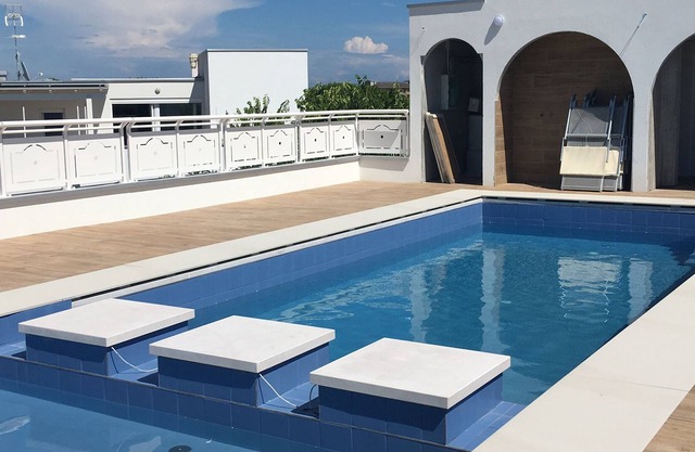 New modern apartment with private roof terrace, big garden, sandy beach 400 mt.