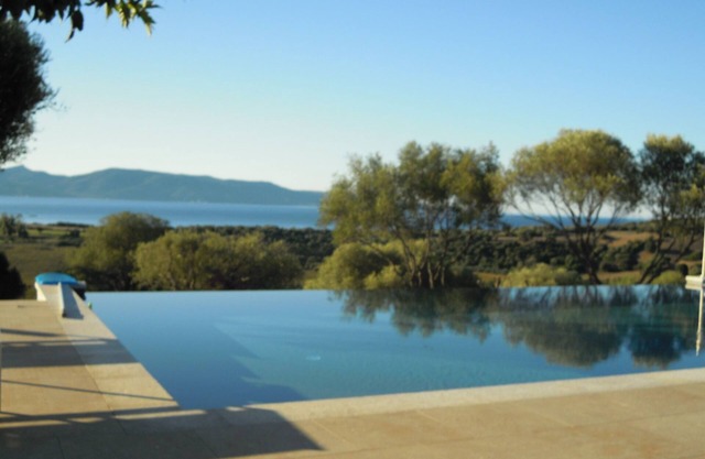 New villa with a private heated pool and a panoramic ocean and mountain view