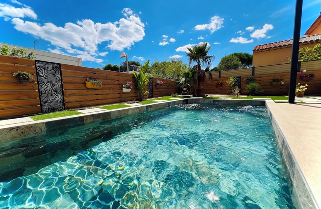 New villa with roof terrace and sea view