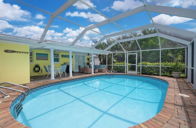 Newly Listed, Fully-Stocked Cape Coral Escape with Heated Pool! Dog Friendly.