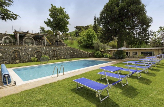 Nice apartment in villa for 13 guests with WIFI, A/C, private pool, TV and patio