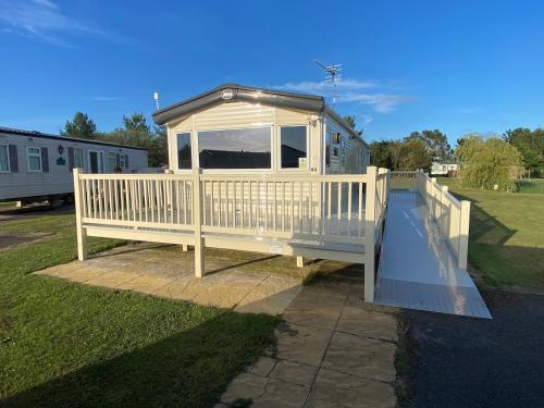 Oak Village 64 - Grange Leisure disability caravan - pet friendly, wifi and ramped decking