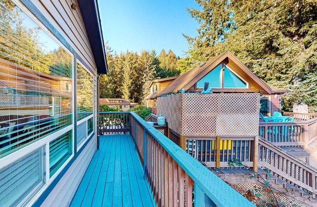Ocean-view home with private hot tub, amazing deck, & prime location