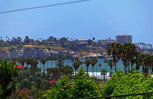Ocean views, hot tub & pool, walk to beach, restaurants, and more!