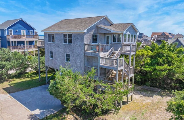 Oceanview Dog Friendly Home with Grills, Screened Porch, and Nearby Beach Access
