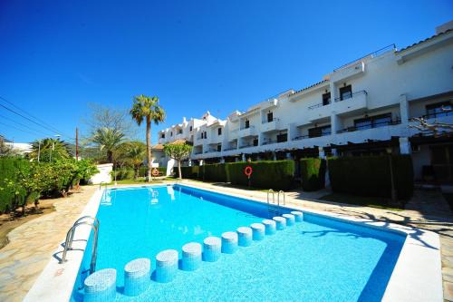 Orange Park Estudio Jardin vista piscina