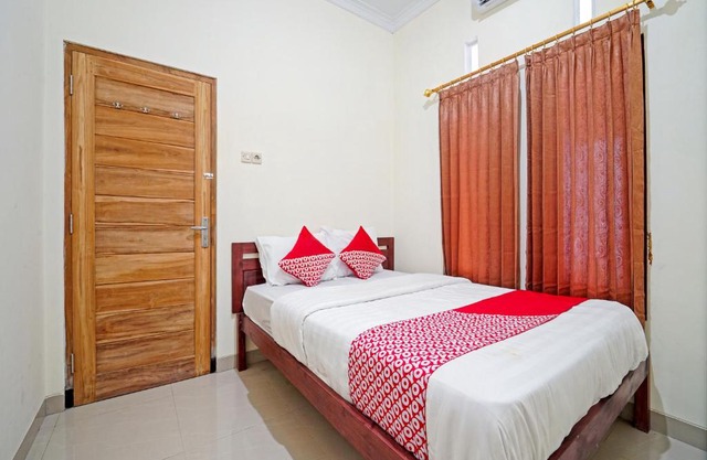 OYO 90869 Happy Homestay Syariah