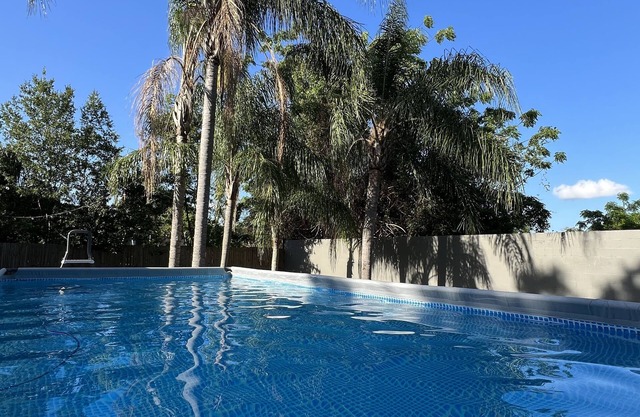 Palm Harbor Fun Hub: Pool, Game Room, Movie Nights