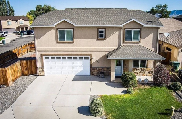 Peaceful home with 4 beds, 3-bedroom house in Grand Junction with AC and WIFI.