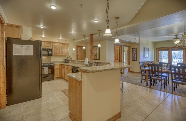 Perched atop Putt Hill, this expansive yet inviting condo is your ideal home away from home