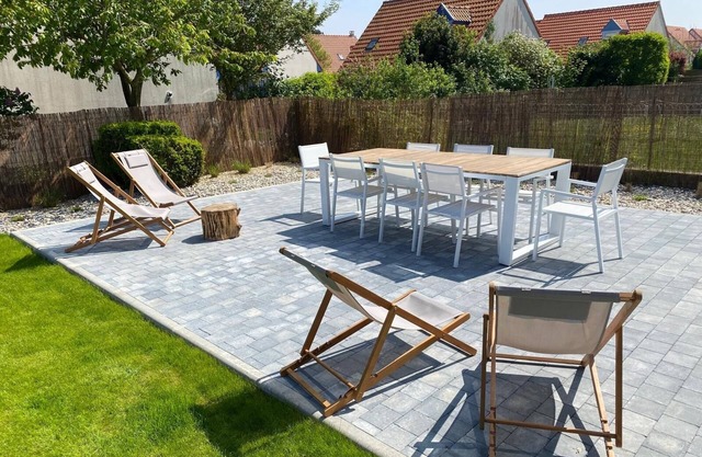 Pleasant house in quiet neighborhood with garage and fenced garden.