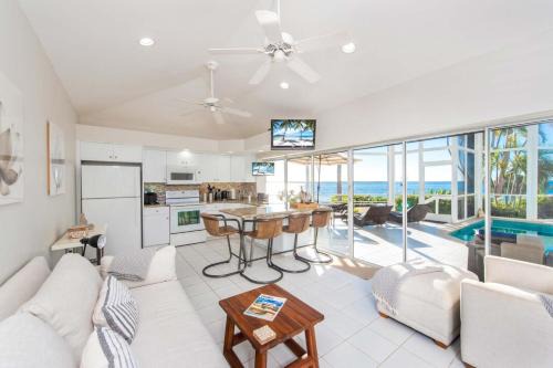 Pools of the Kai 6 - Beachfront Condo with Private Pool Atrium, Modern Kitchen, and Outdoor Grill