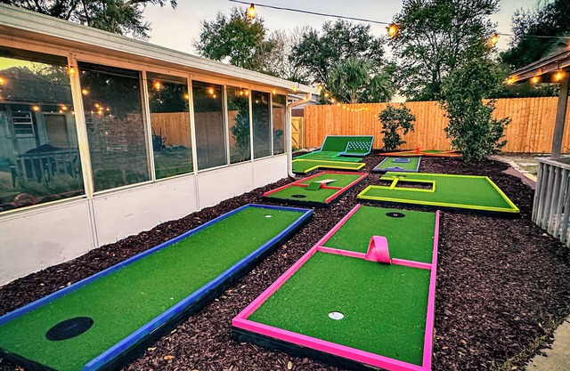 Private 4-bed/3 bath house with putt-putt golf, heated pool, and hot tub.