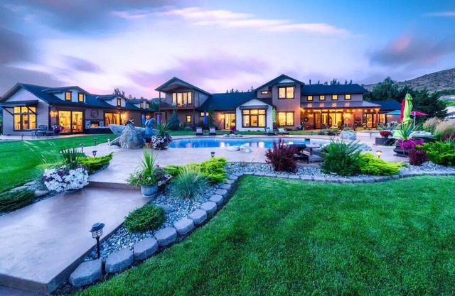 Private All Suite Lakefront Estate with Pool House Set on Manicured Grounds