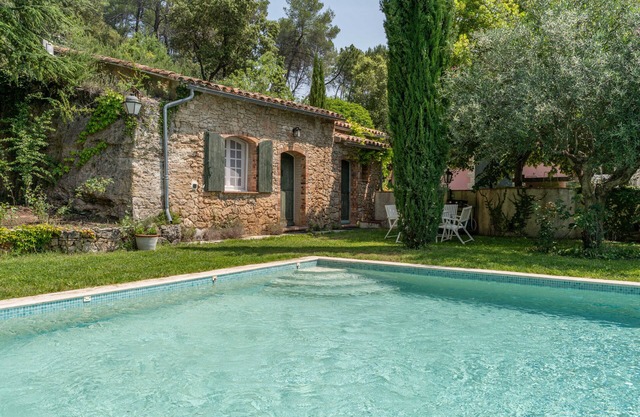 Provencal farmhouse, warm and cozy, nestled in the heart of the pool gardens.