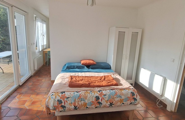 Quiet apartment with private garden and parking space