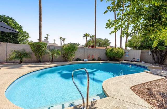 Quiet Scottsdale retreat with enclosed yard, pool, patio, grill, game room & W/D