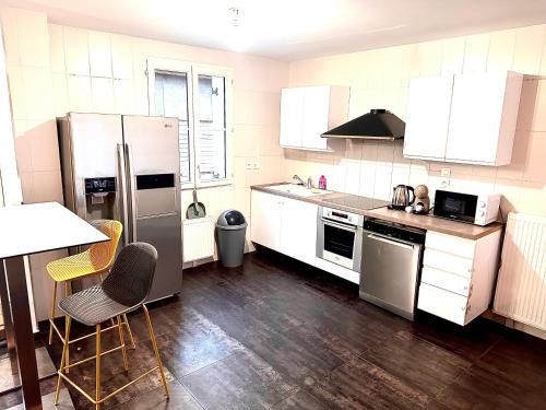 réf ble Chambre privée dans une villa à 10 min de Disneyland paris