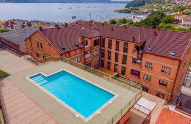 Raxó con piscina en la urbanización