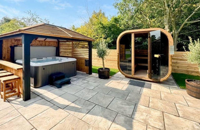 Recently upgraded with Gazebo over hot tub and side bar with stools.