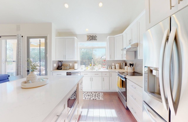 Refined home with private pool, putting green, backyard, & fast WiFi - near golf