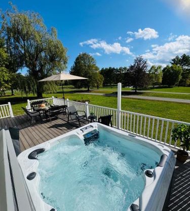 Relaxing Pondfront Escape with Hot Tub & Outdoor Fire Deck