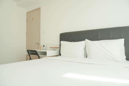 Restful and Comfy 2BR Tokyo Riverside PIK 2 Apartment By Travelio