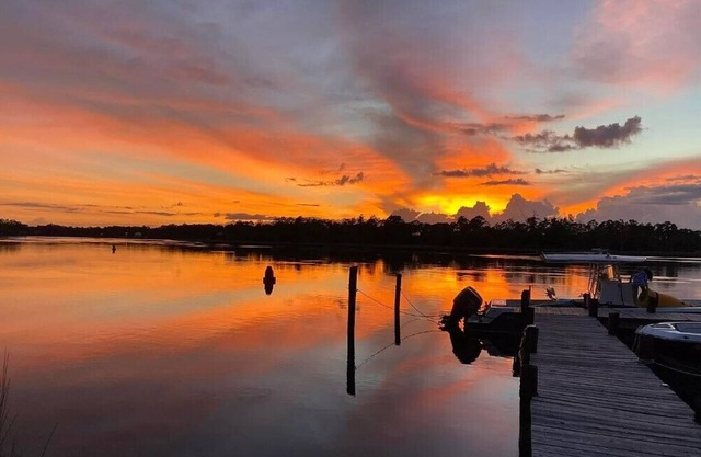 River front, less than 5 miles to the gulf, private dock & boat launch!