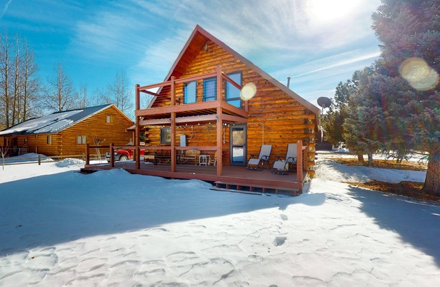 Riverfront home with river & valley views, wood stove, deck, & W/D